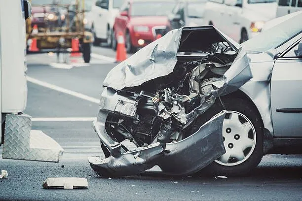 Severe front-end car accident damage showing impact injuries risk