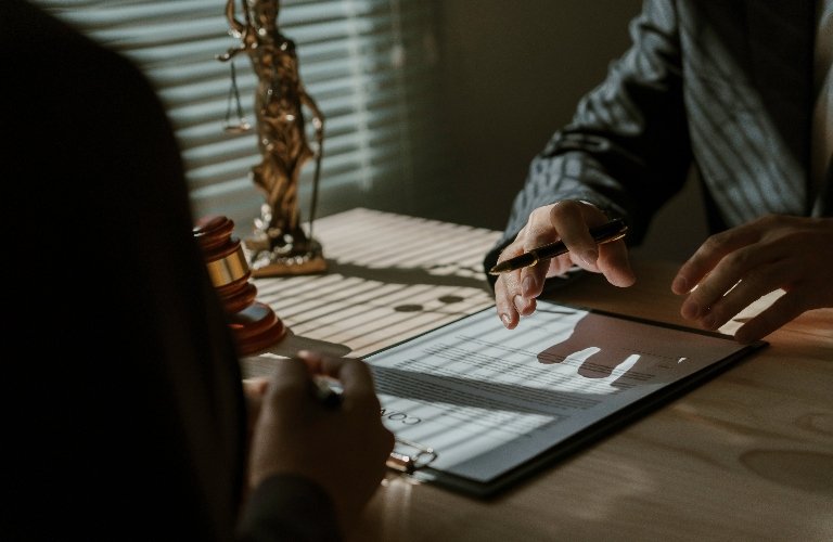 Personal Injury Lawyer Consulting Client About Legal Claim