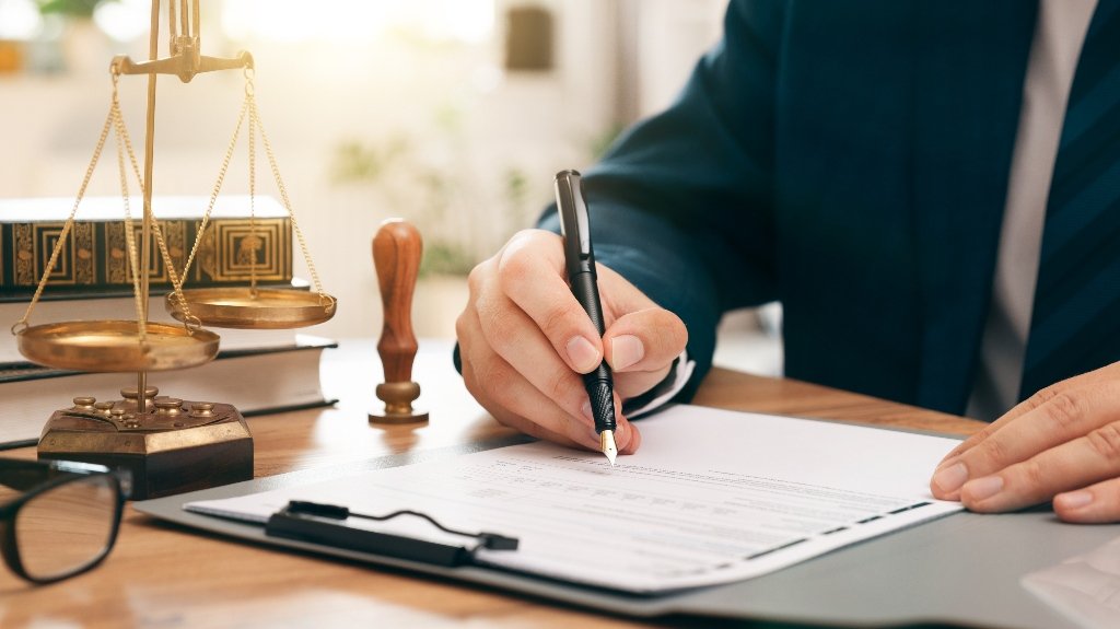 Lawyer is reviewing documents_s client meeting with personal injury attorney for free case evaluation