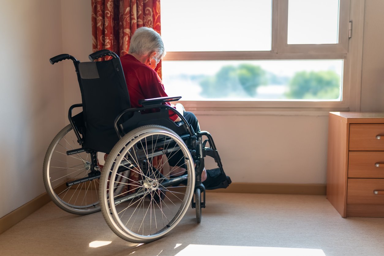Nursing Home Abuse Lawyer Reviewing Evidence With Client